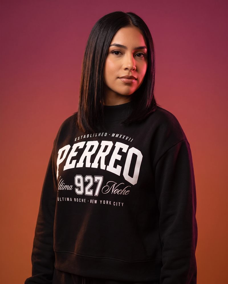 Perreo Ultima Noche sweatshirt worn by model, Latin Takeover sunset studio
