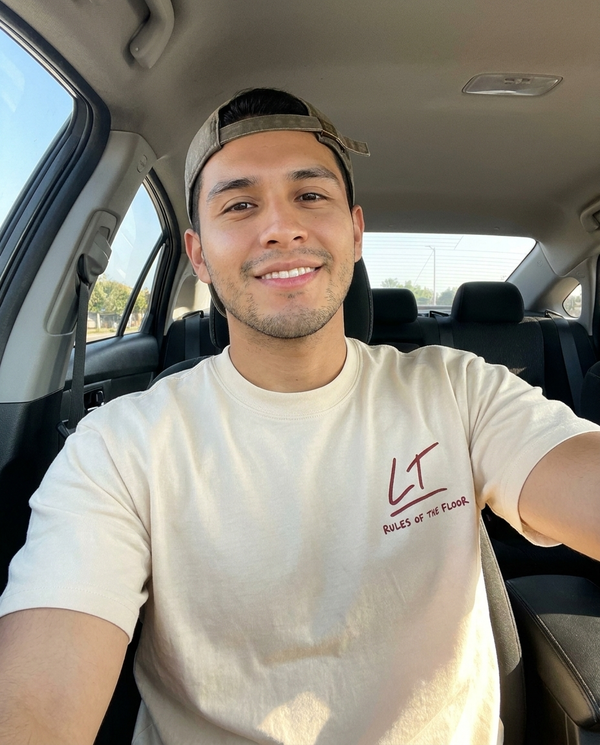 Customer car selfie in Rules of the Floor tee